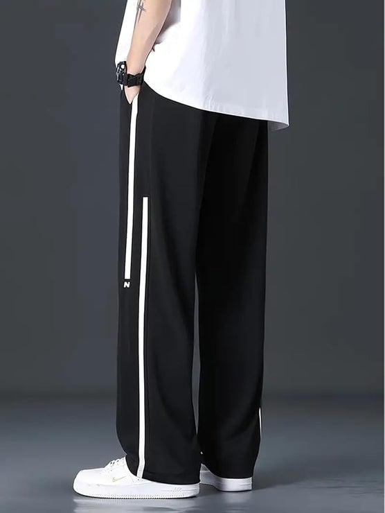 Mack Jonney Solid Black Regular Fit Polyster Lycra Trackpant For Men